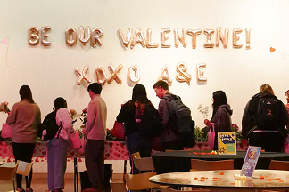 Students in line for flowers